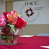 Flowers and HACC logo Flowers and HACC logo